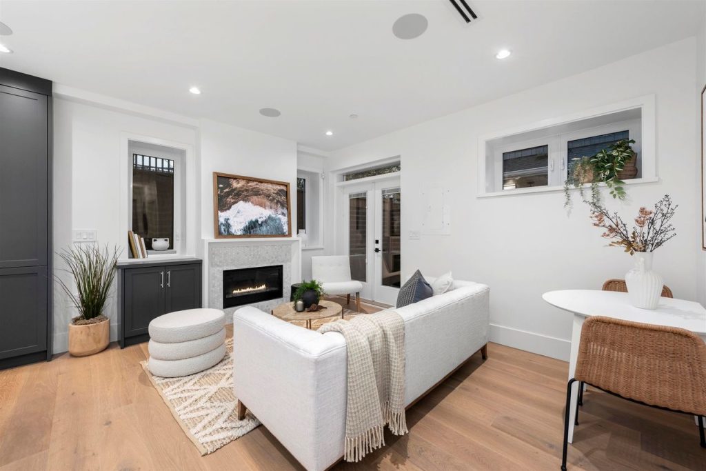 When adding a basement suite in Vancouver ensure that like this one, it features a separate entrance, proper ceiling height requirement, electrical, heating, and safety measures in place.